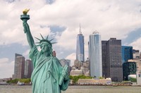 Statue of Liberty with Lower Manhattan skyline - © shutterstock.com/Pisaphotography